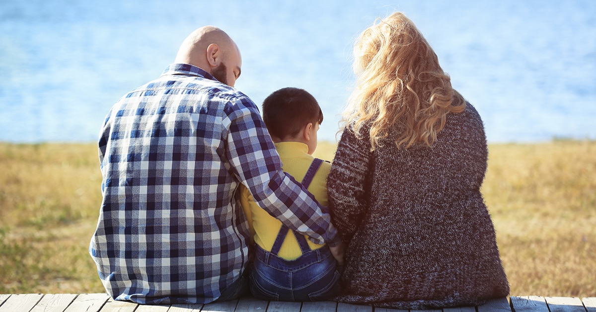 overweight family near the water