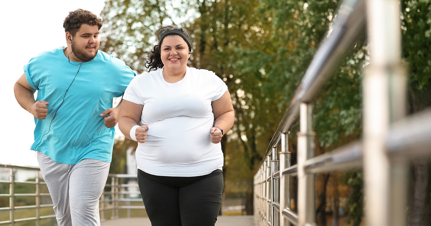 couple jogging in nature