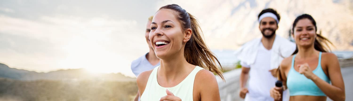 Young group of people jogging